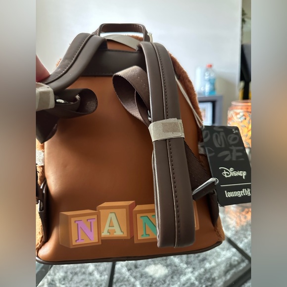 Loungefly Bags Disney Peter Pan Nana Loungefly Mini Backpack Poshmark